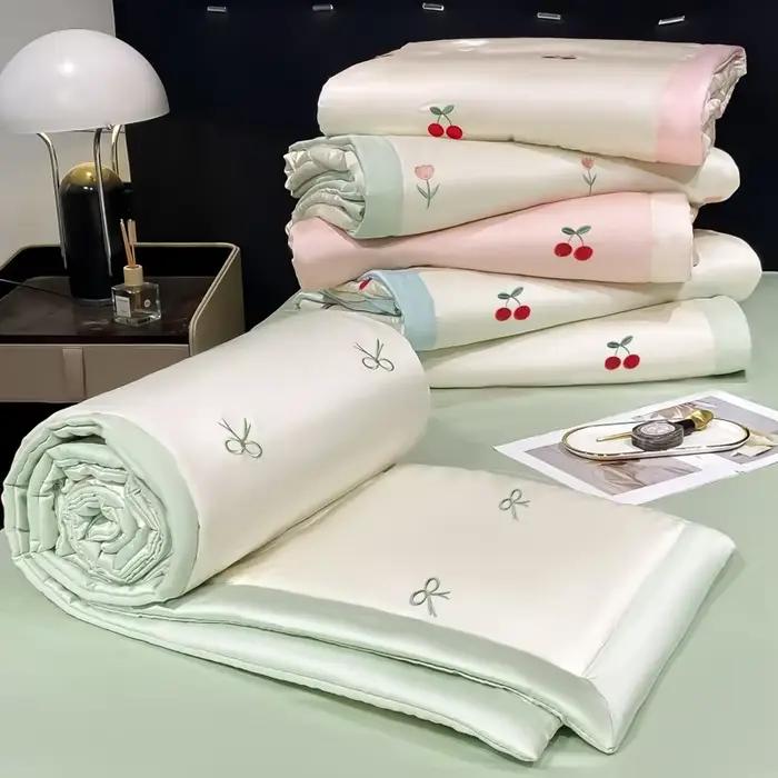 Couette brodée haut de gamme pour le printemps et l'été