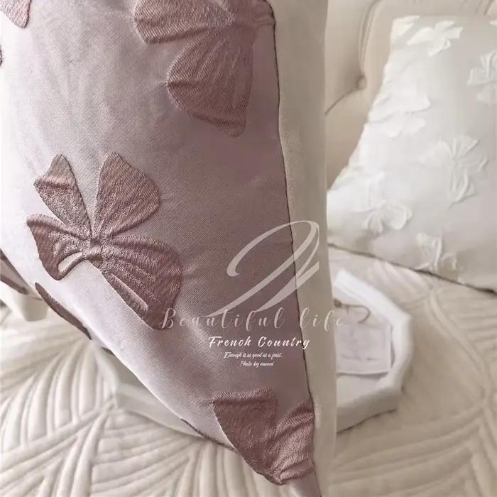 Taie d'oreiller Jacquard avec nœud rose