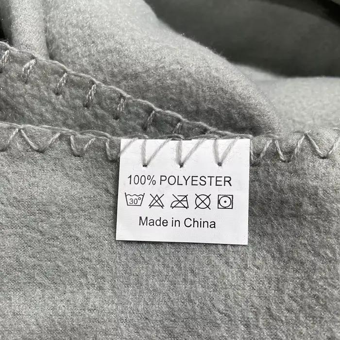 Couverture polaire de couleur unie