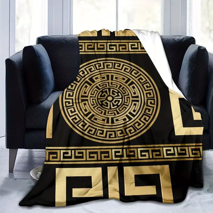 Couverture à motif de clé grecque