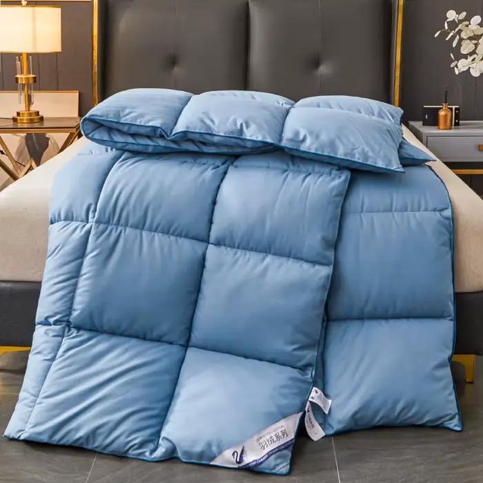 Couette en duvet d'oie blanche comme rembourrage