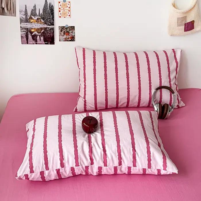 Ensemble de housse de couette rayée rose simple