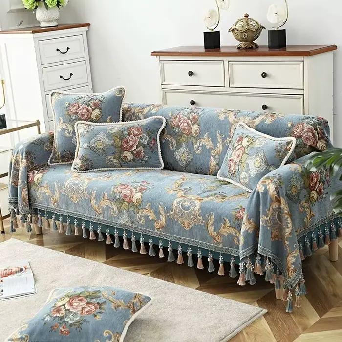 Couverture de canapé en coton avec pompon