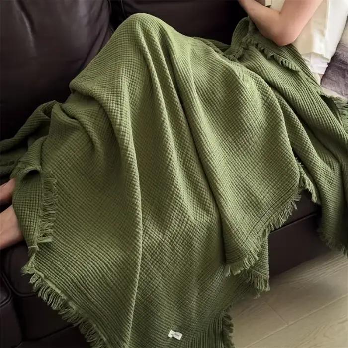 Couverture tricotée à franges de classe