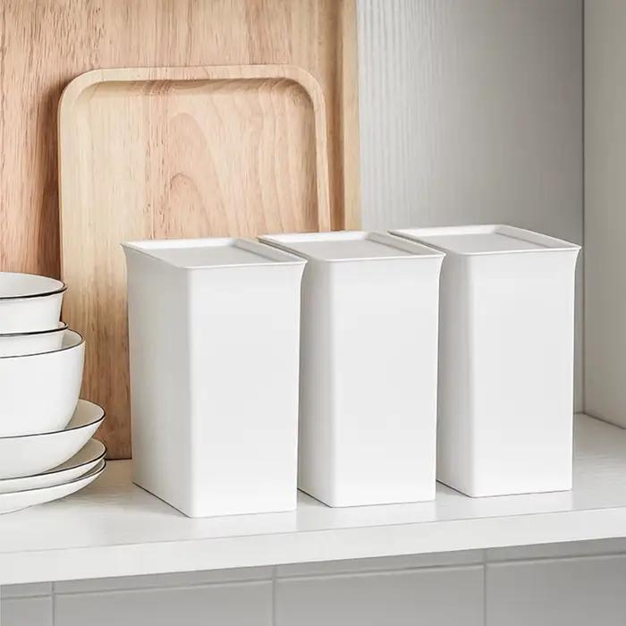 Boîte de rangement pour lessive avec couvercle