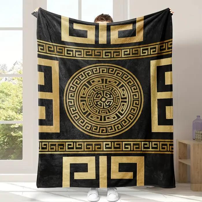 Couverture à motif de clé grecque