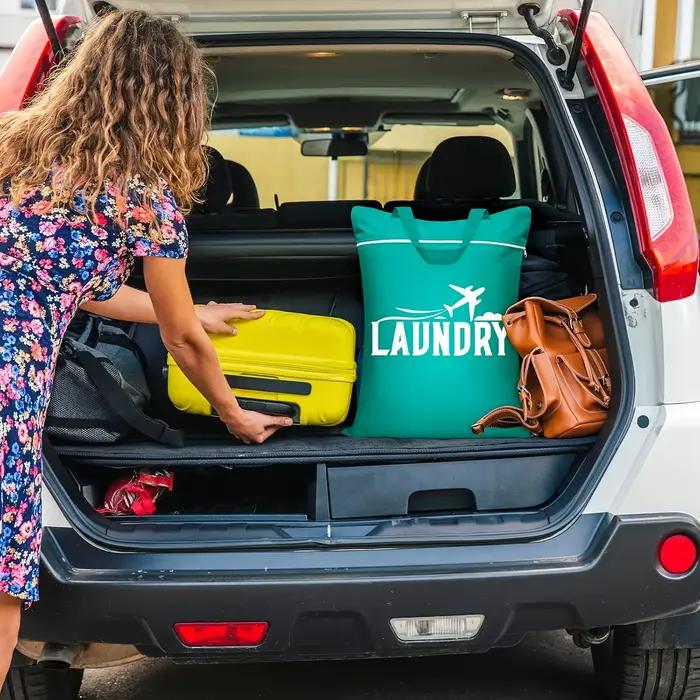 Sac à linge de voyage avec poignée